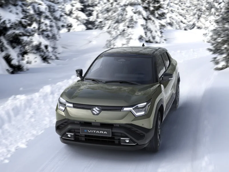 a car driving on a snowy road